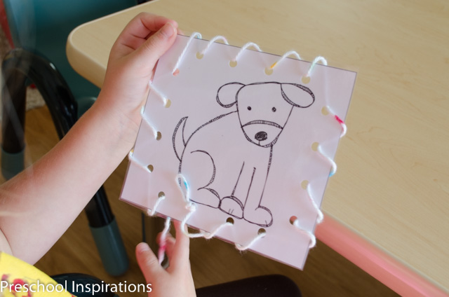 Practice fine motor skills with these adorable Brown Bear lacing card busy bag printables.