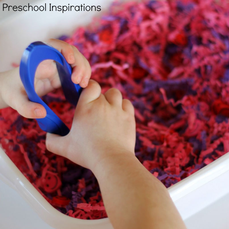 Valentine's Day colorful hearts sensory bin for kids