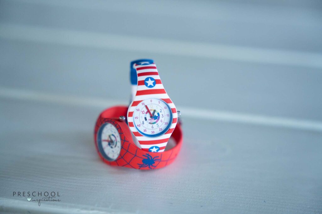 america watch and spiderman watch on a table