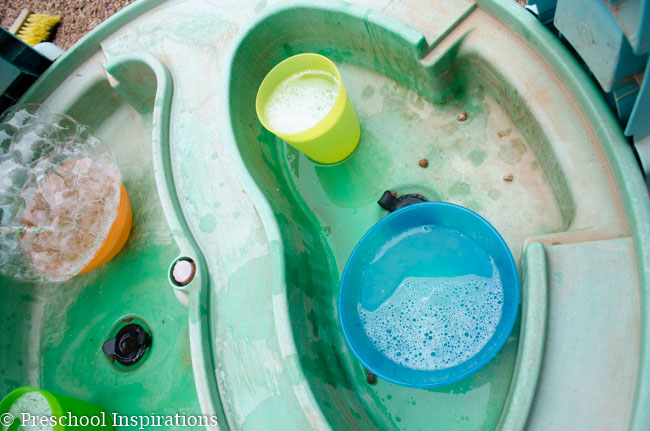 Let children make bubbles to their heart's content in this bubble blowing sensory table-2