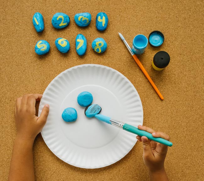 Make a nature-inspired rock clock to teach children math skills