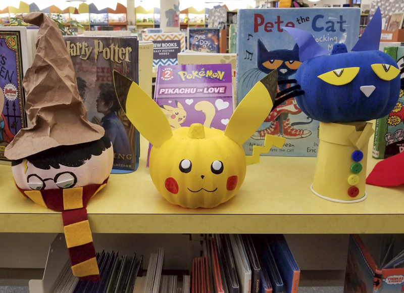 Harry Potter, Pikachu, and Pete the Cat pumpkin book character