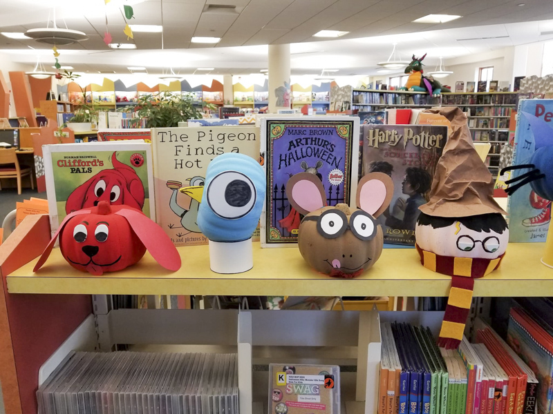 Clifford, Pigeon, Arthur, and Harry Potter pumpkin book characters