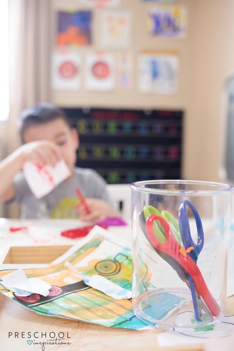 Recycled art is perfect for kids to practice their scissor skills on