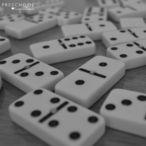 dominoes scattered on a table